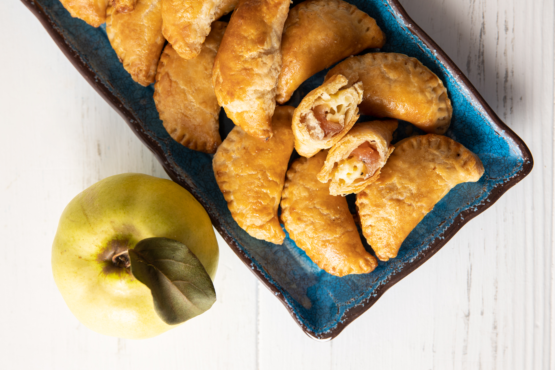 quince and brie empanadas with a quince fruit